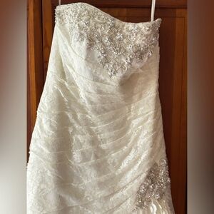 Elegant Ivory Lace Wedding Dress with Beaded Details
